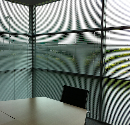 large aluminium blinds in an office boardroom