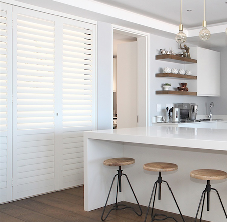 white sliding shutters in a modern kitchen environment