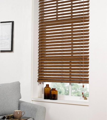 dark brown wooden blinds in the lounge